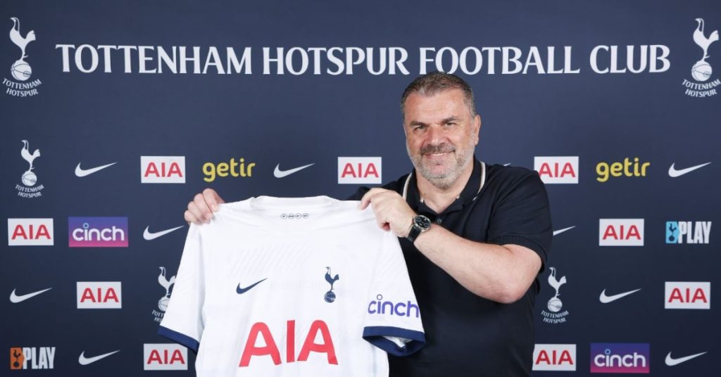 ange-postecoglou-pictured-holding-a-tottenham-jersey-after-being-appointed-as-the-clubs-new-first-team-manager-in-2023