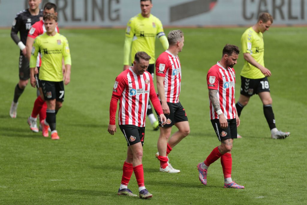 Sunderland players exit the pitch after the Sky Bet League One match at the Stadium of Light, Sunderland. Picture date: Sunday May 9, 2021.