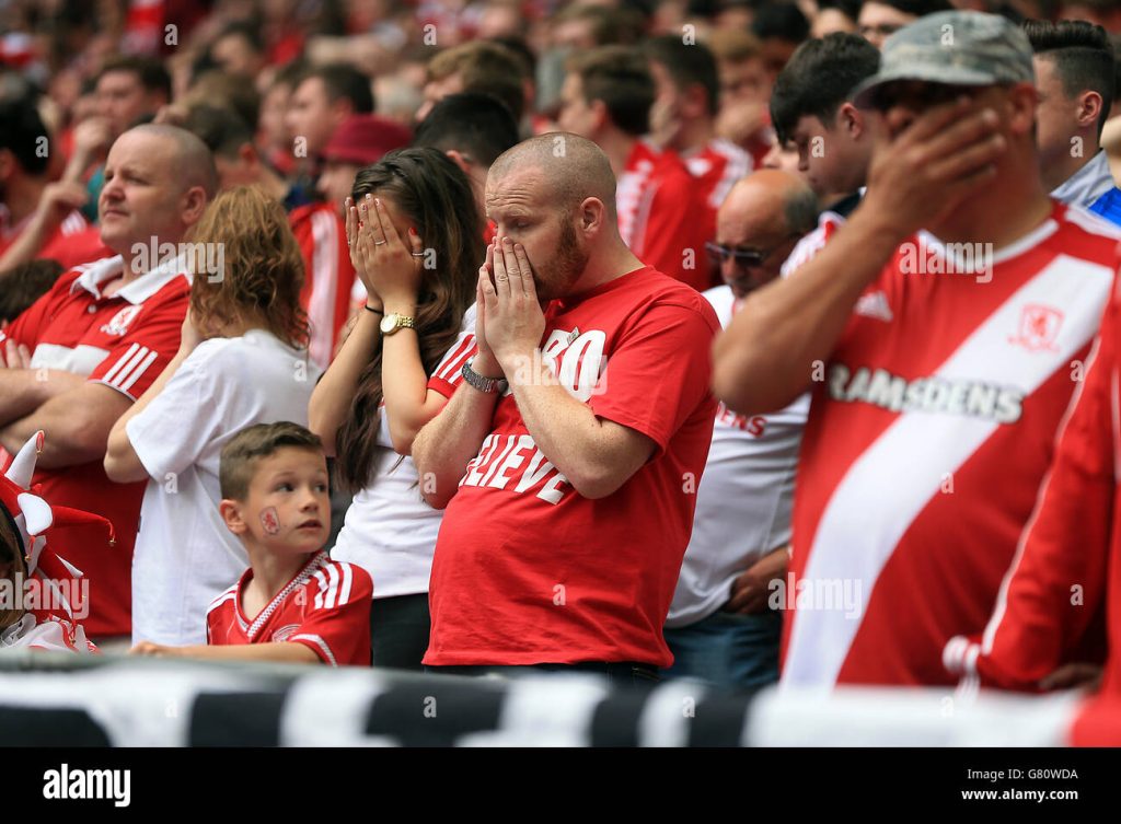 middlesbrough-fans-look-dejected-as-they-see-their-side-concede-a-G80WDA